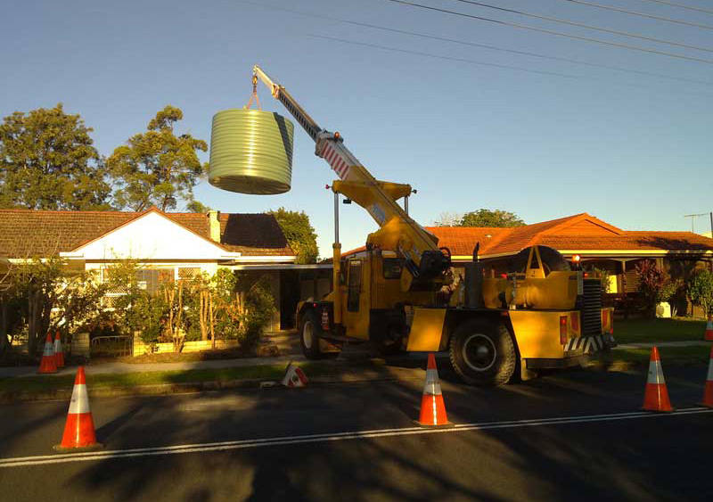 Water tank delivery to a difficult site